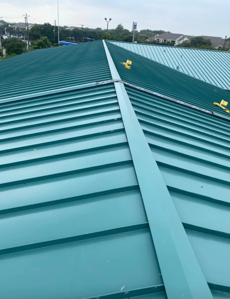 Green commercial metal roof ridge and valley for Metal Roof Repair in Enterprise